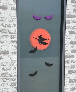 Halloween scene with bats and a witch, made with Holiday Spray